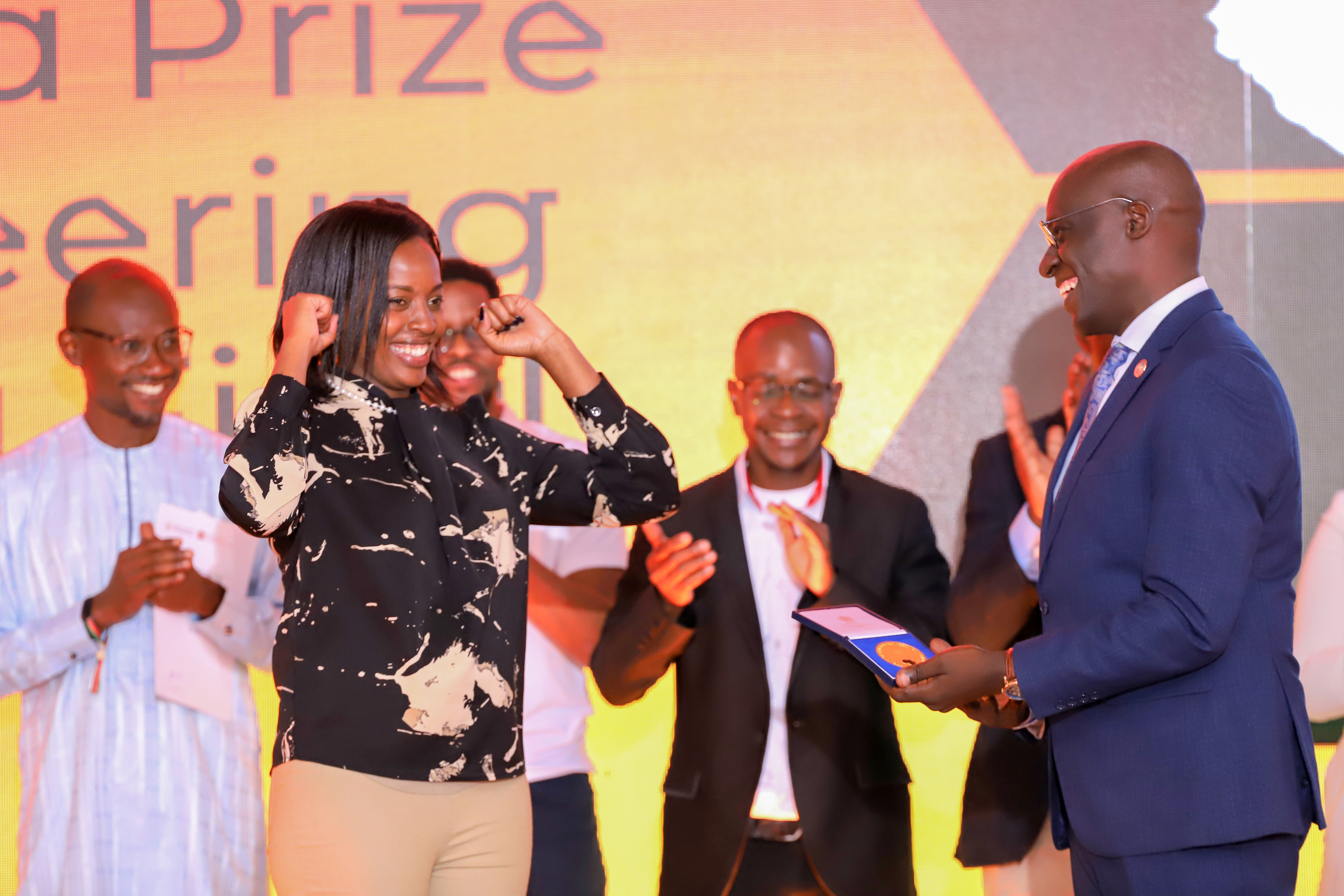 Kenya woman entrepreneur receives her winners award at the Africa Prize final